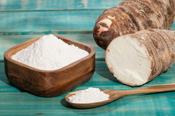Taro Root of Colocasia esculenta and Organic Taro Flour in a bowl