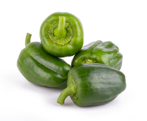 Group of fresh green bell peppers with slices isolated on a white background close up