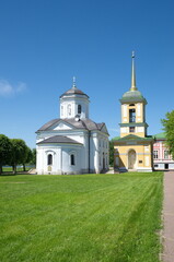 Moscow, Russia - June 17, 2021: Kuskovo Estate . The bell tower and the Church of the Origin of the Honest Trees of the Life-Giving Cross of the Lord (the All-Merciful Savior) 