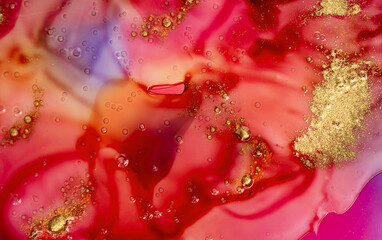 Red paint stains background with gold glitter. Liquid transparent bubbles surface.
