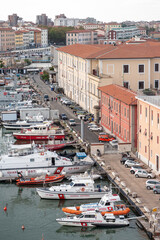 Livorno: Boats moored along the city dock..