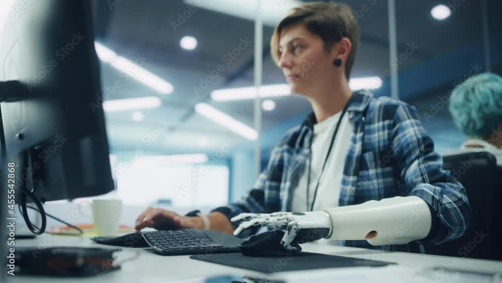 Poster diverse body positive office: portrait of motivated woman with disability using prosthetic arm to wo