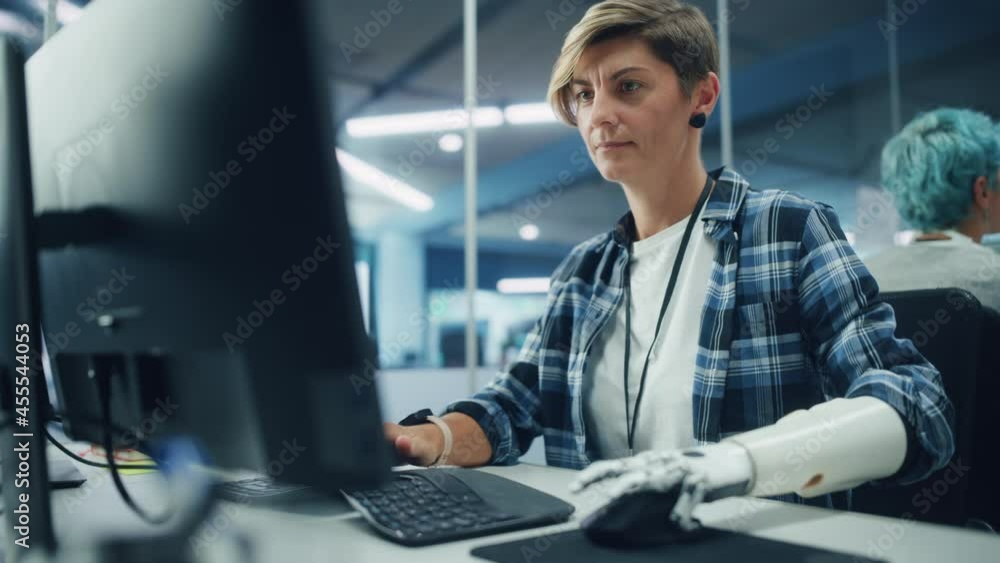 Poster diverse body positive office: portrait of motivated woman with disability using prosthetic arm to wo