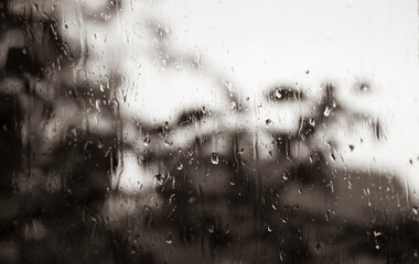 Raindrops on the window pane, black and white