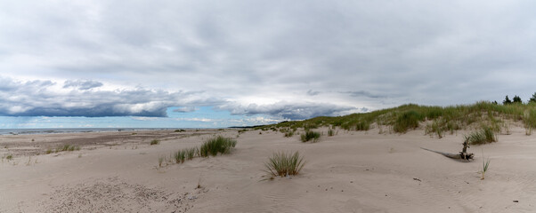 panorama view of endless wandering sand dunes in Slowinski National Park on the Baltic Sea in northern Poland - obrazy, fototapety, plakaty