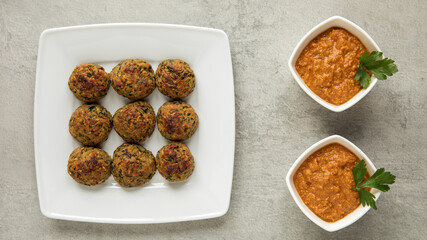 Courgette kofta balls with tomato sauce. Vegan food. Indian cuisine.