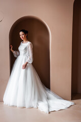 Fototapeta premium Beautiful bride. Wedding hairstyle and make up. Fashion wedding dress