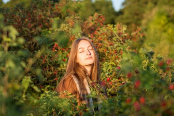 Portrait of a woman in a city park