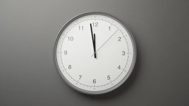 Clock Face on Dark Grey Office Wall in Timelapse