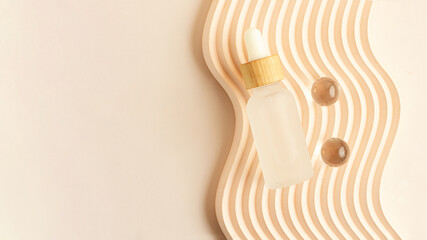 Cosmetics bottle with dropper,zero waste packaging with wooden cover. Box lying on the wavy podium.Pastel colors,good as mockup,large banner.