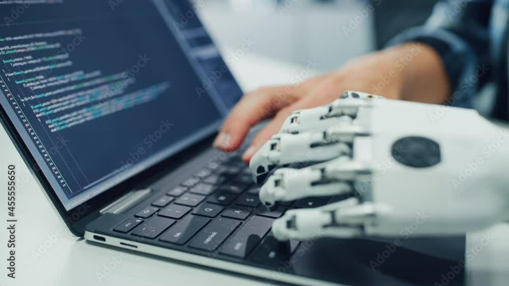 Poster Close-up on Hands: Programmer With Disability Using Prosthetic Arm to Work on Computer Keyboard. Specialist Swift and Natural Use of Myoelectric Bionic Hand To Type Code for Software at Night