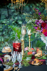 Banquet table with food and decor for Halloween celebration