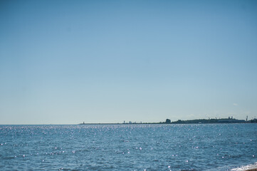 Obraz premium Beautiful sea day landscape. Light waves on the coast