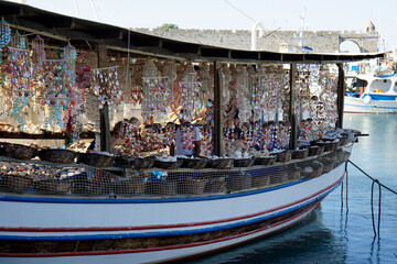 Fototapeta na wymiar boat full of souvenirs on rhodes