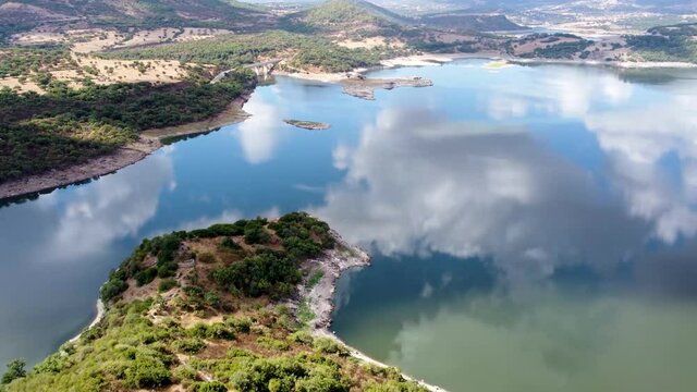 Aerial view of Temo Lake under a cloudy sky. Sardinia, Italy