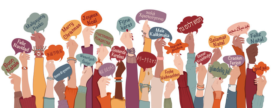 Many arms raised of diverse and multi-ethnic people holding speech bubbles with text -Merry Christmas- in various international languages. People diversity. Christmas greetings. Equality