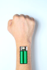 Rechargeable batteries in a battery pack implanted in a human hand. Energy of the human body.