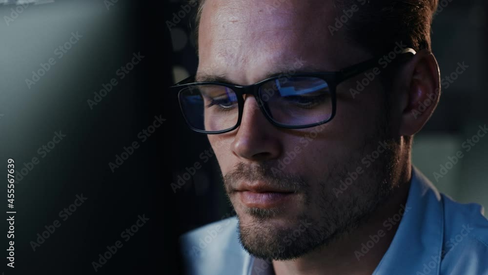Poster Portrait of Male Startup Digital Entrepreneur Working on Computer, Looking at Camera Line of Code Reflecting in Glasses. Developer Working on Innovative e-Commerce App using Big Data. Warm