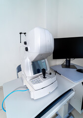 X-ray equipment in modern clinic. Up-to-date apparatus. Radiographic and fluoroscopic diagnostic system with rotating table. Closeup