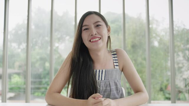 Beautiful transgender Asian woman is greeting through video calls, she is doing business online via social media.
