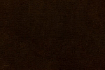 Dark non-uniform paper with spots and inclusions.