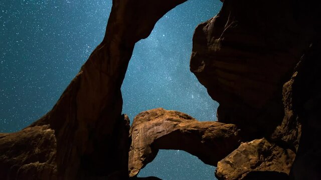 Tilt Up Time Lapse Shot Of Natural Rock Formation Against milky way Starry Sky - Smith Rock State Park, Oregon