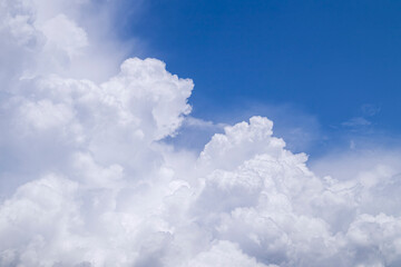 Naklejka na ściany i meble beautiful clouds on the blue sky as a background