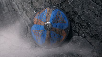 Viking shield with ornaments over rock background, with mist