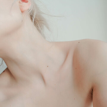 Close-up shot of woman's neck and shoulders