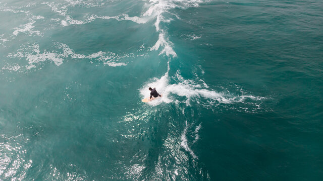 High angle view of person surfing on body of water