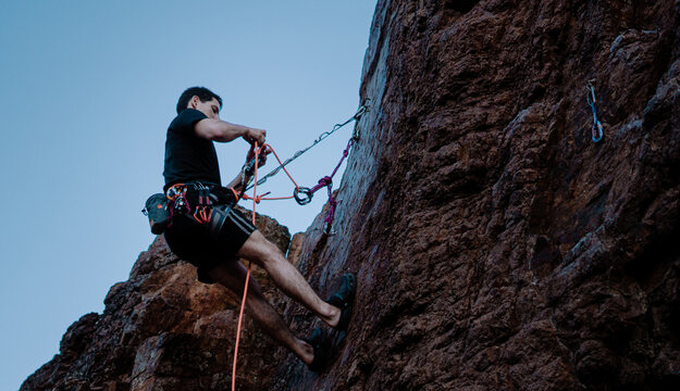 Man climbing a mountain