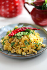 a plate of scrambled eggs with patato