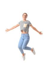 Jumping young woman on white background