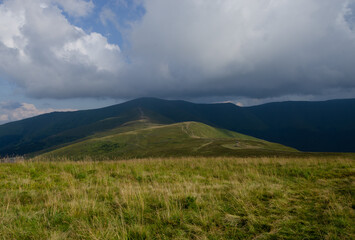 Fototapeta premium clouds over the mountains