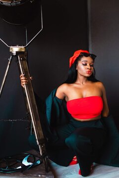 Woman pouting her lips for fashion photoshoot