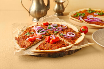 Delicious Turkish pizza on color background