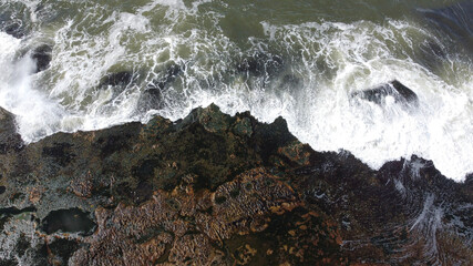 waves crashing on rocks