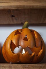 decoration with a halloween pumpkin with a candle