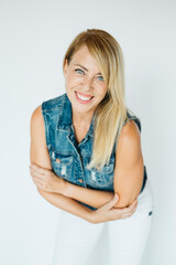 Fototapeta premium Beautiful middle aged Blonde Woman Portrait Over White background