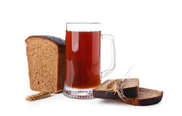 Mug of fresh kvass and bread on white background