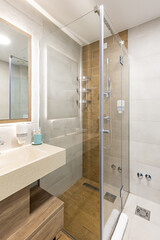 Interior of a hotel bathroom with a shower cabin