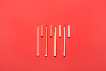 Colorful markers on color background