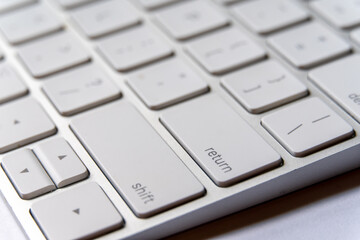 Close up view of Return Key in a White Keyboard