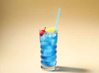 Glass of Blue Lagoon cocktail on color background