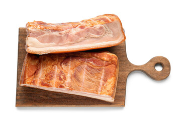 Wooden board with tasty smoked bacon on white background