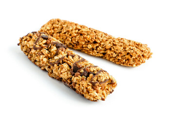 Two cereal bar on white background. Healthy dessert snack. One granola bar with chocolate.