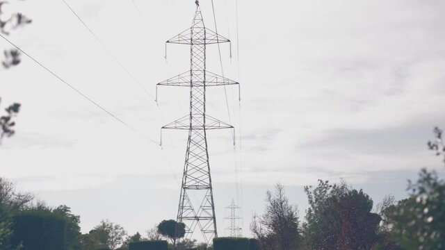 Transmission line tower in a park