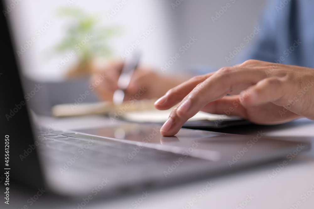 Poster Businessman operate on the table being checking data office desk background and writing note on table. Concept to checklist.