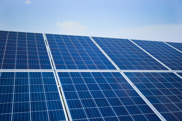 Solar panels fields on a green hills. 