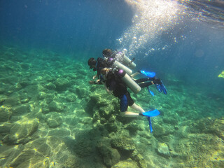 Tourists scuba dive Mediterranian Sea. Marmaris,Turkey.